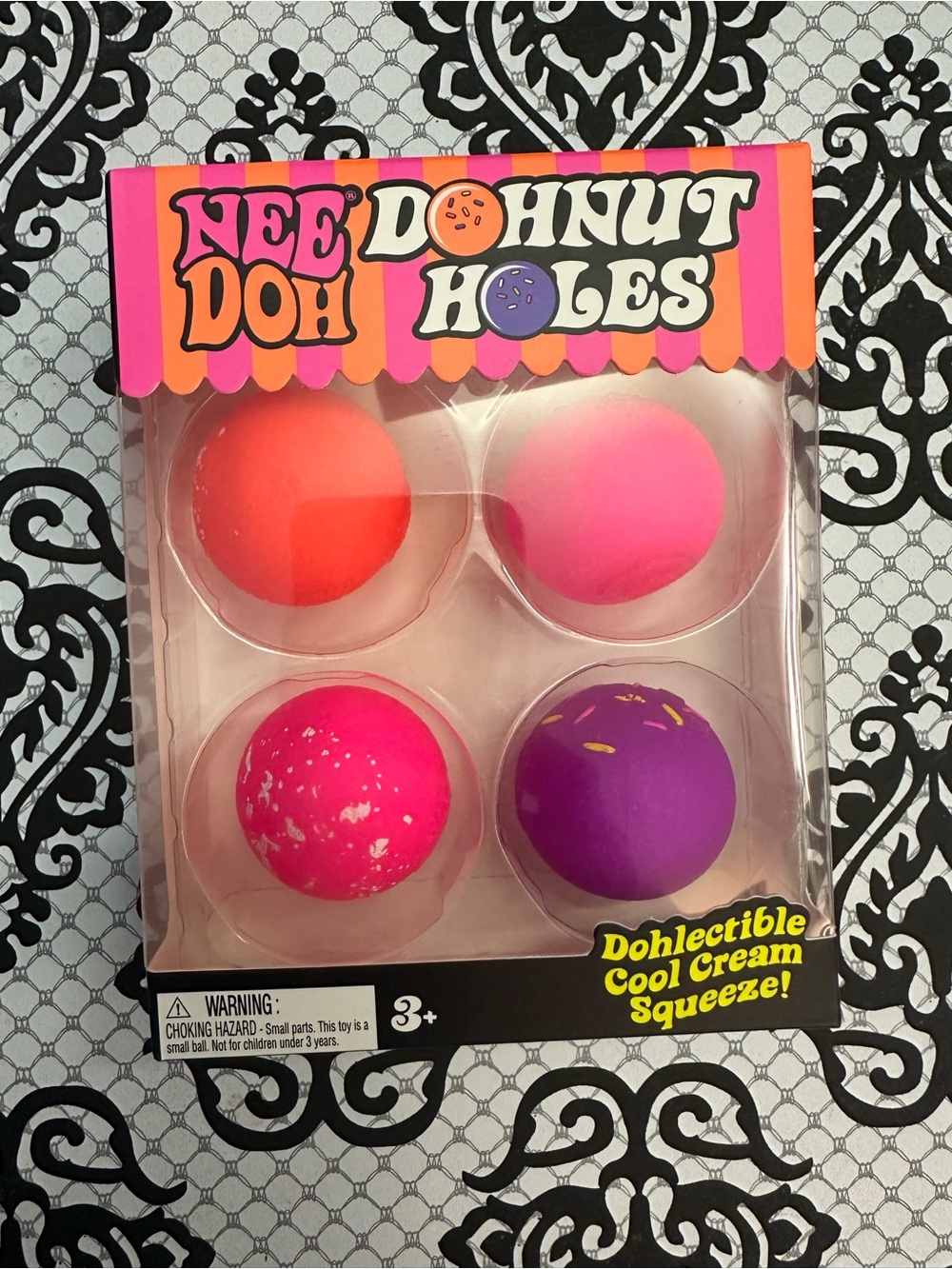 NeeDoh Donut Holes Squeeze Pack — Pink, Orange, Hot Pink, Purple